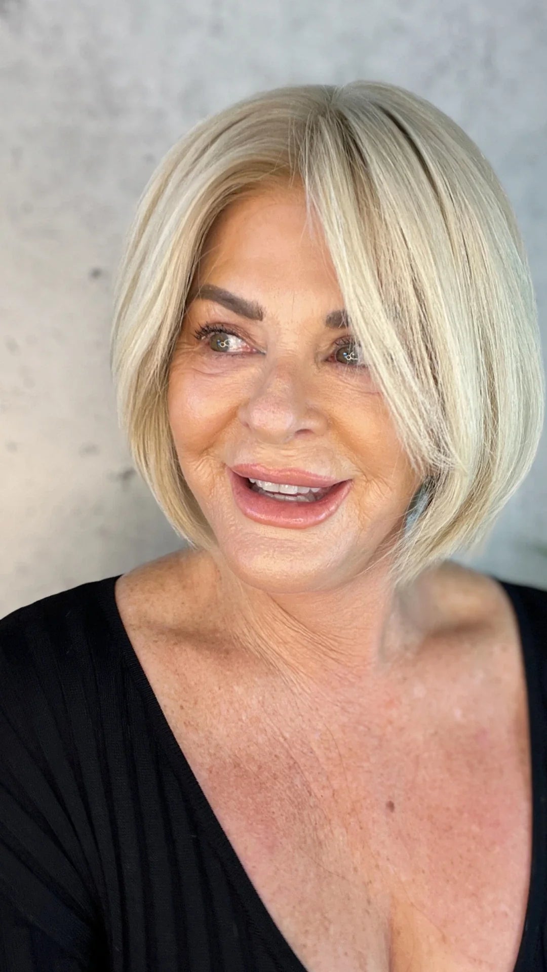 A high-definition close-up capturing the undetectable lace front hairline of a luxury human hair wig.
