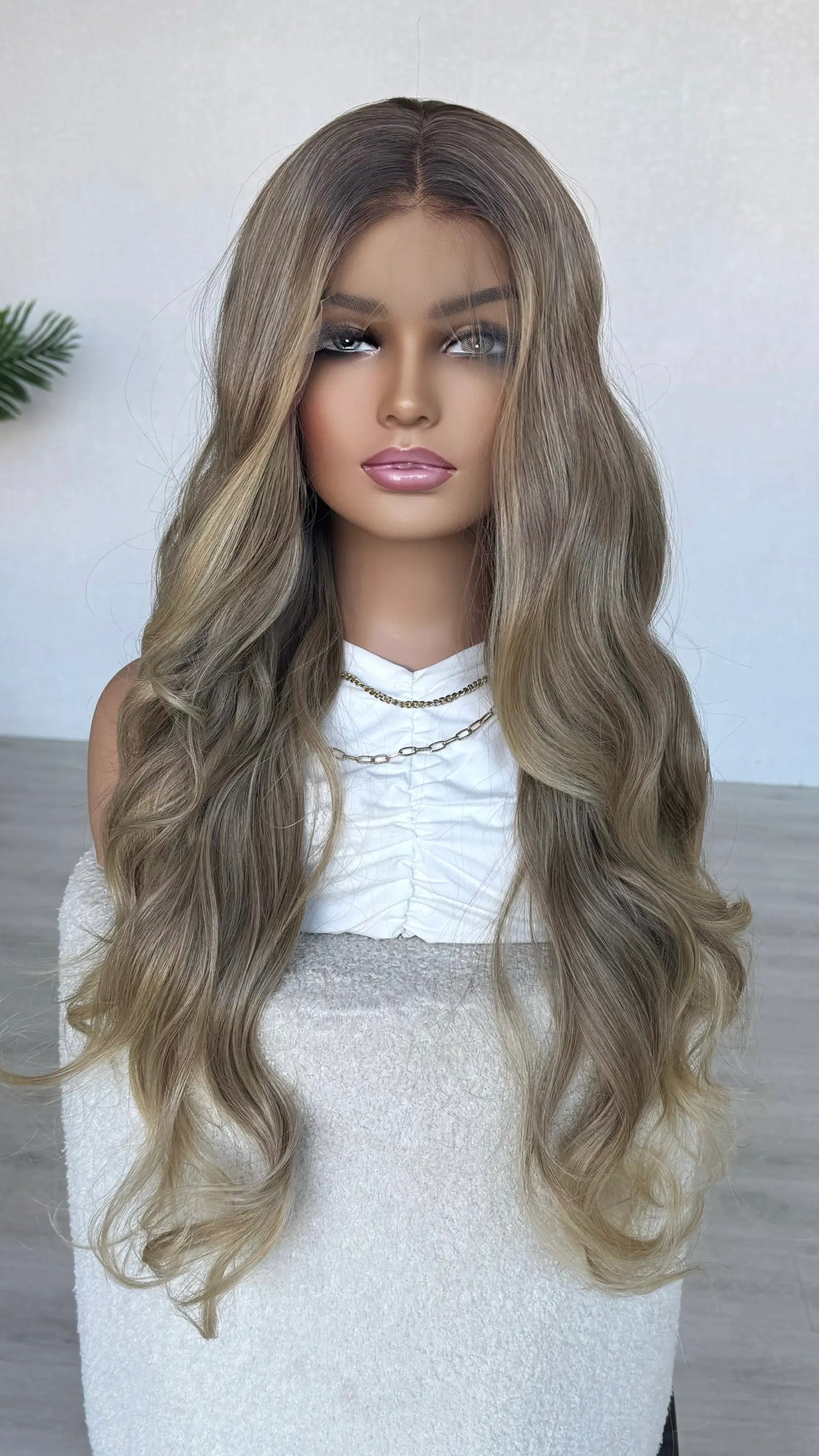 soft honey blonde middle part, ,long length 28 inch hair. heat safe wig.