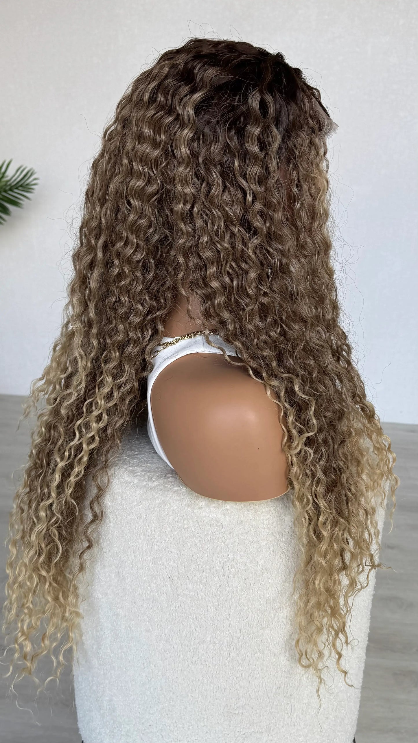 side view, long curly lacefront synthetic wig australia. heat safe synthetic hair.