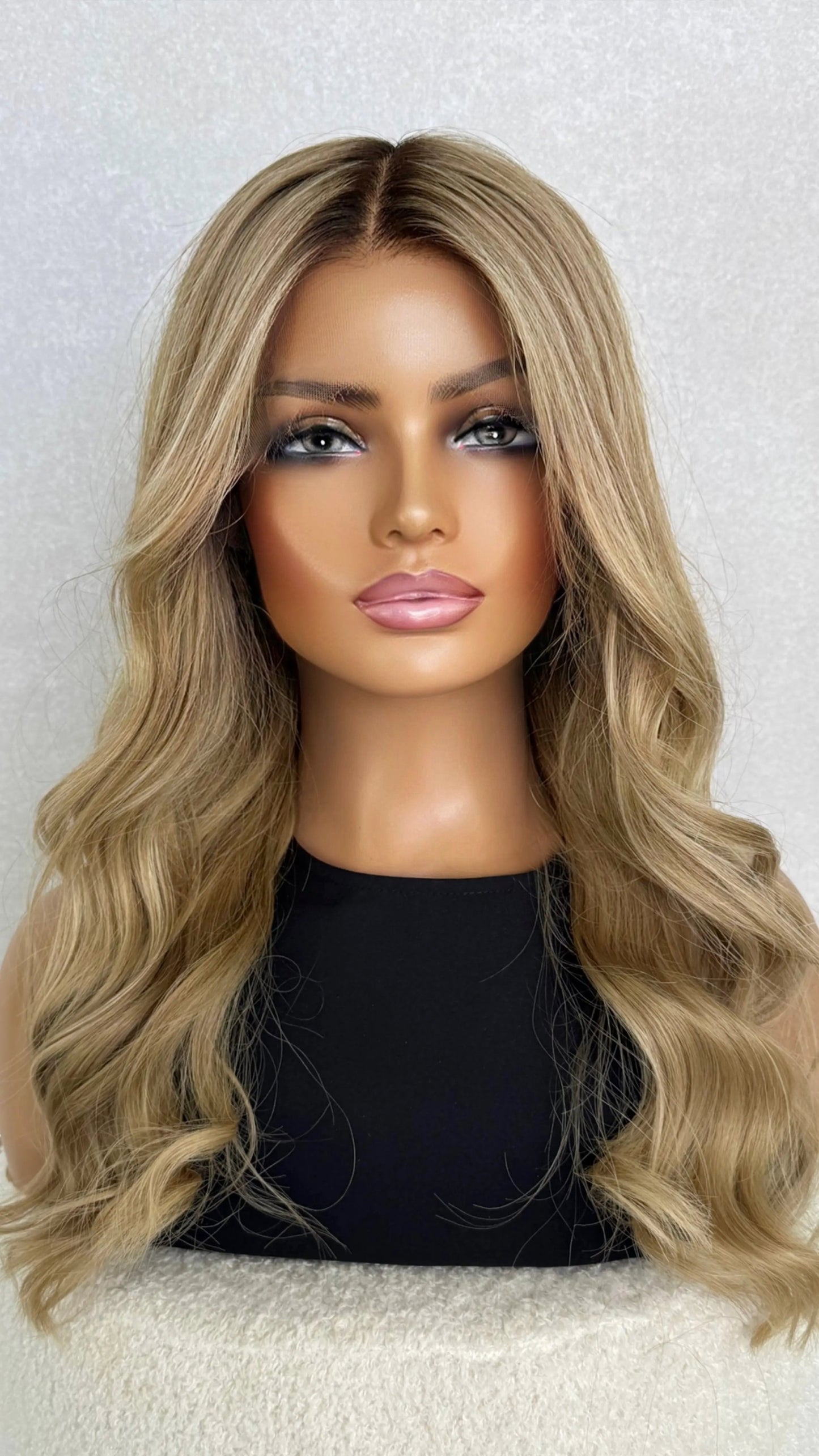 22-inch blonde lace front wig with soft waves and natural highlight