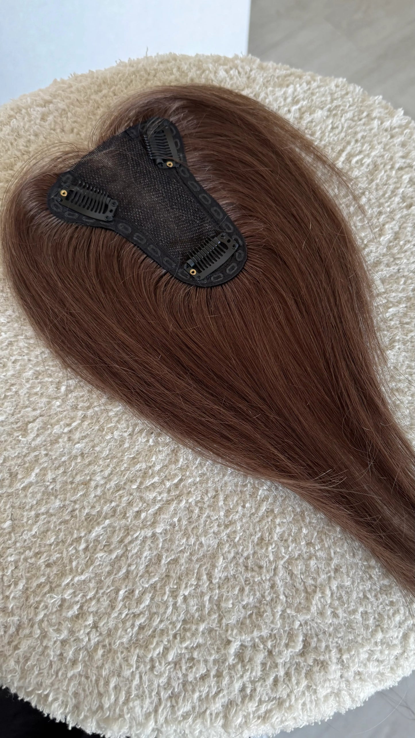 mini topper inside view showing mono base human hair topper.