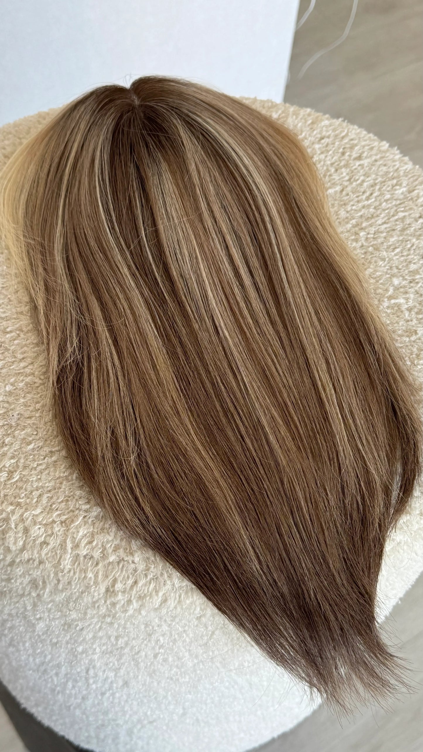 lacefront topper from top view, showing hair colours