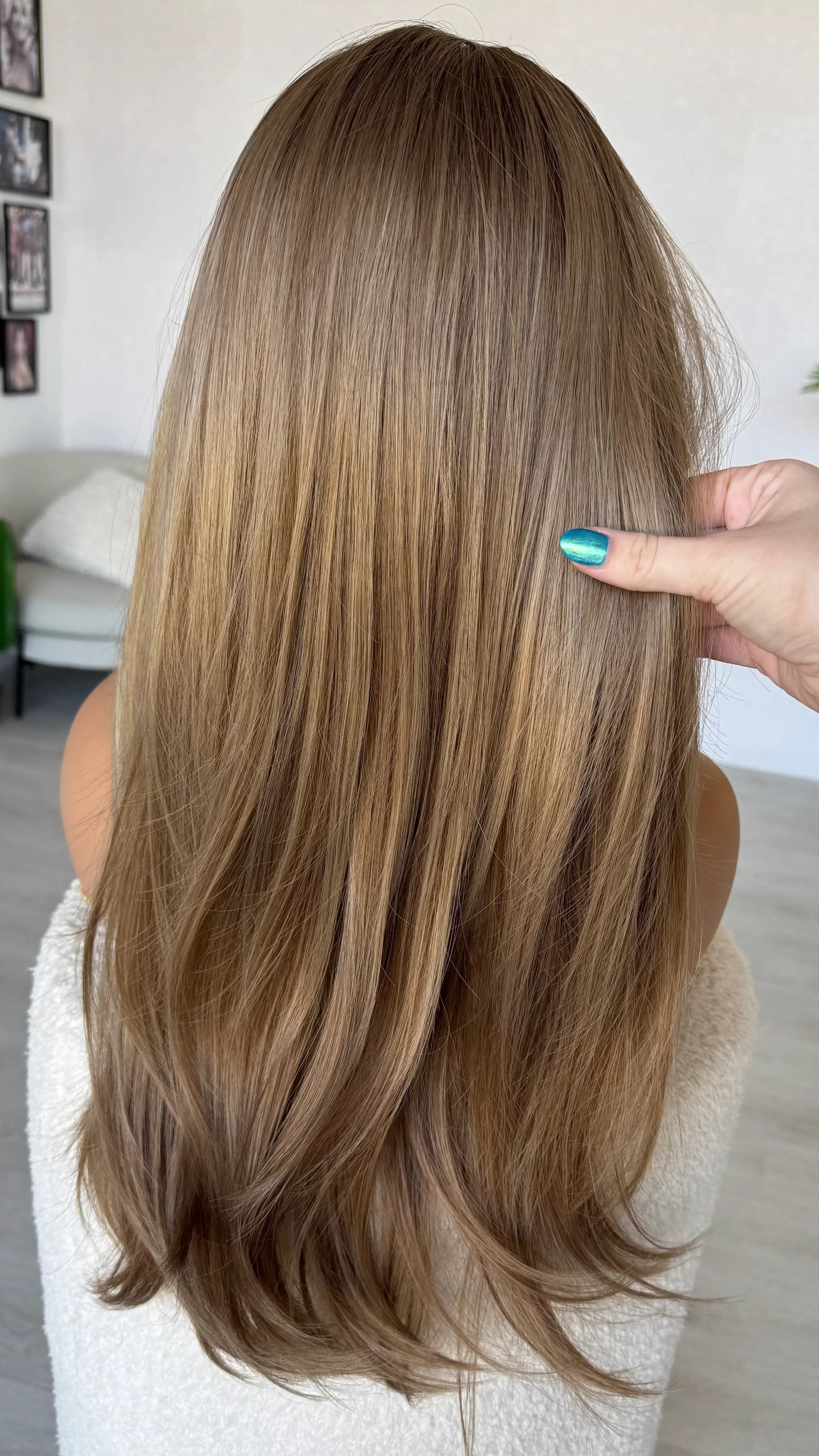 back view holding long layered hair, blonde ombre colour, wigs australia. gold coast.