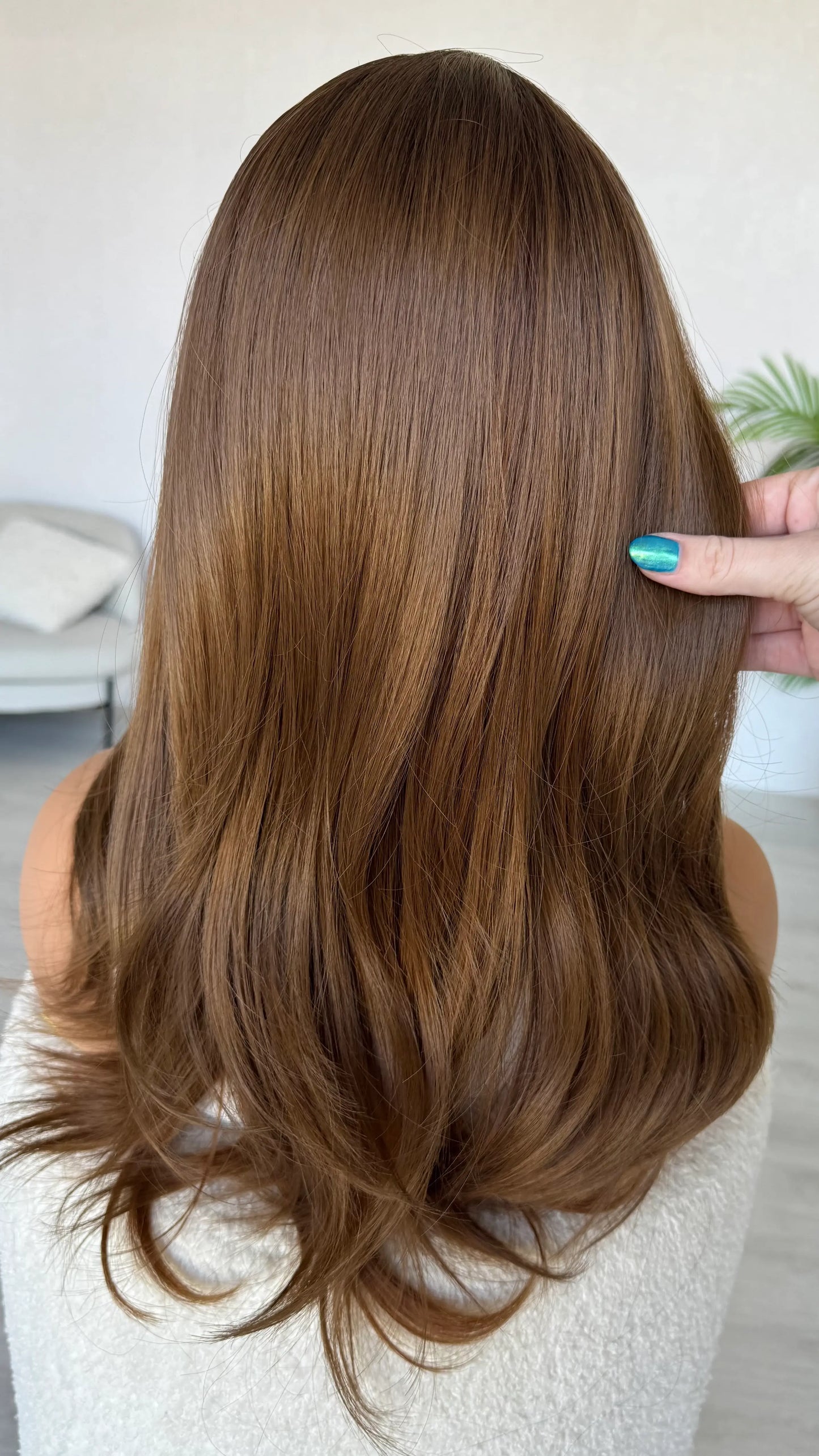 heat safe synthetic from behind, holding the long brunette hair, australia wigs.