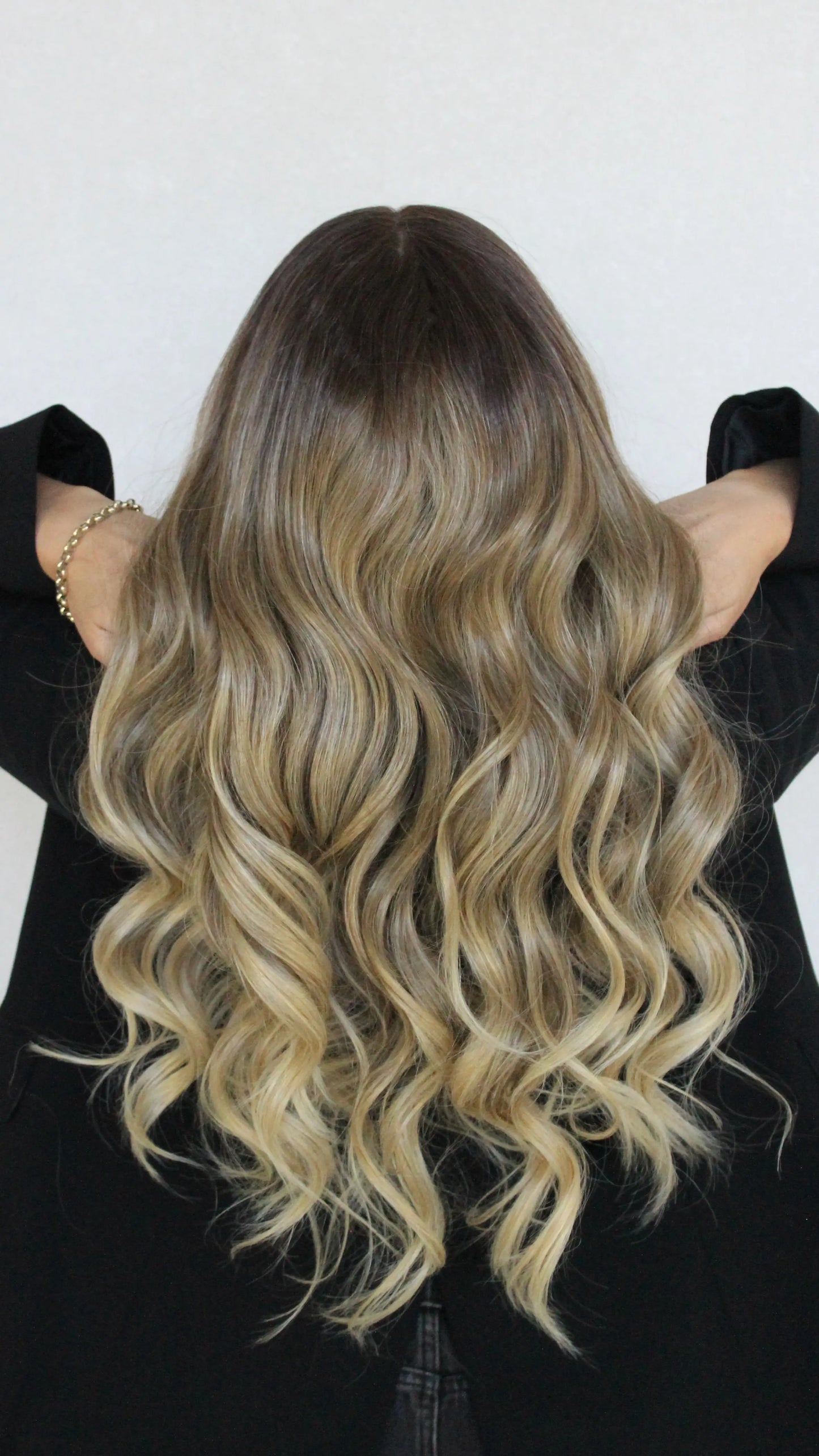 back view latte wig, ombre hair, behind view.