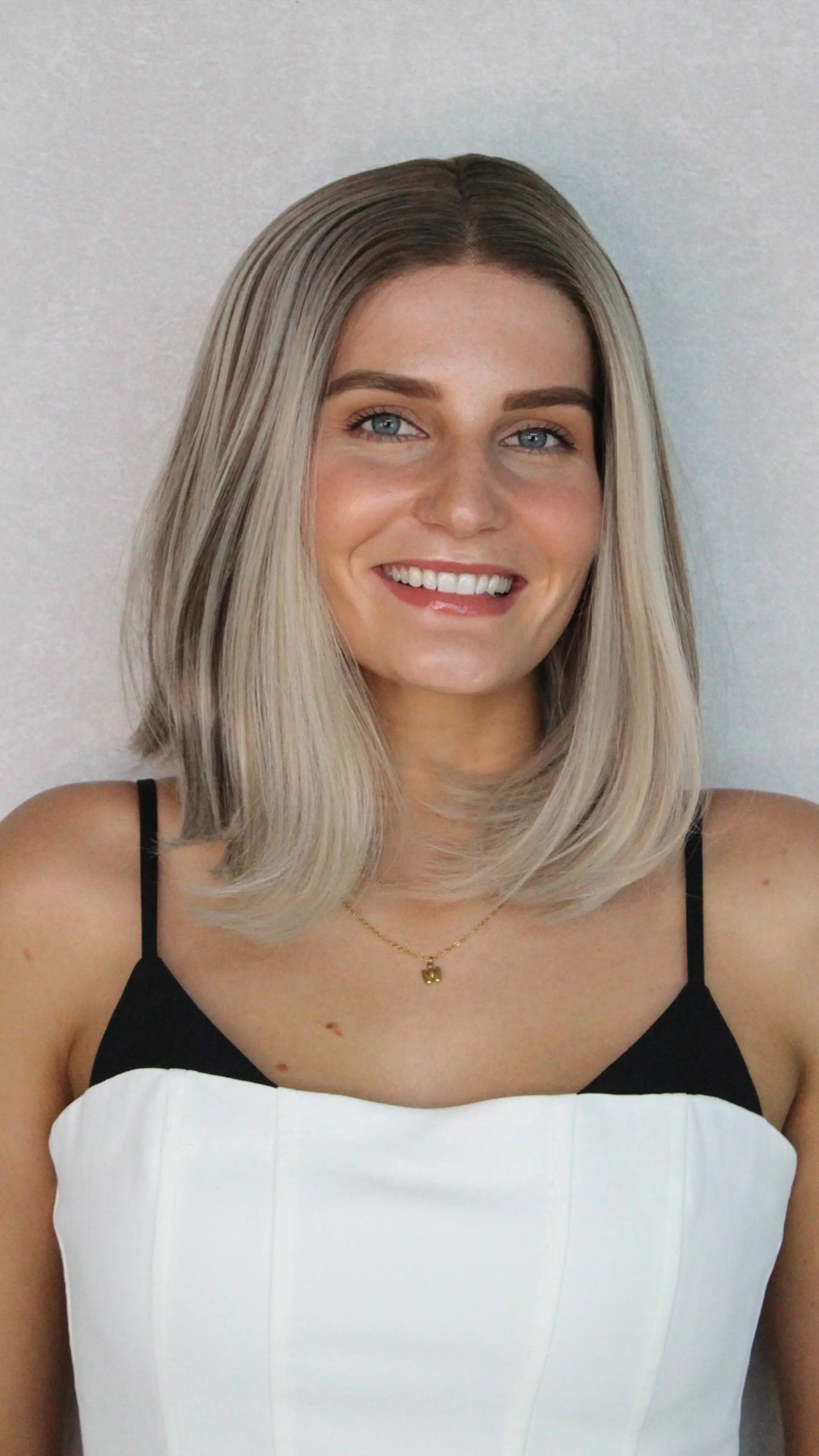 ash blonde synthetic wig with Dark root