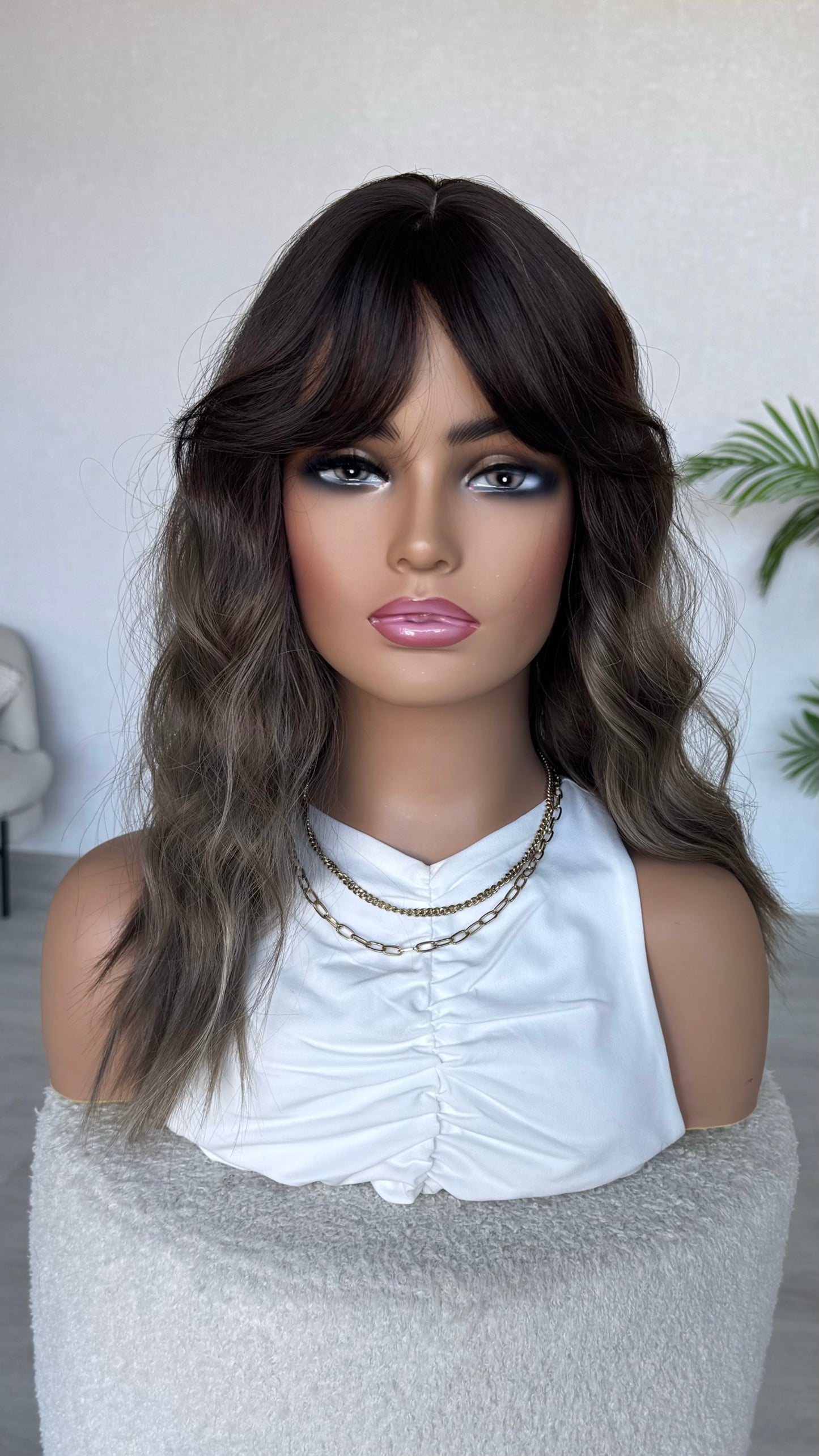 ash brown hair middle part wavy hair ash