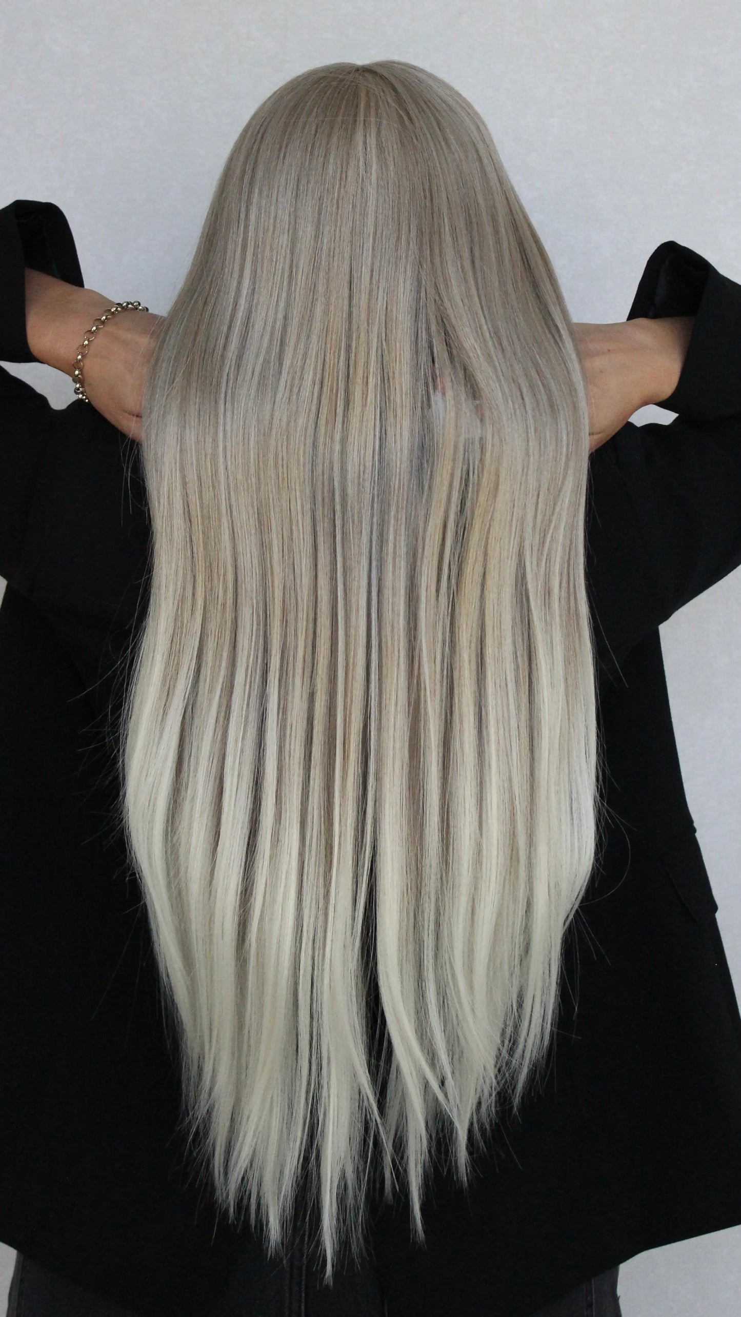 from behind angel synthetic, long length hair, white blonde.