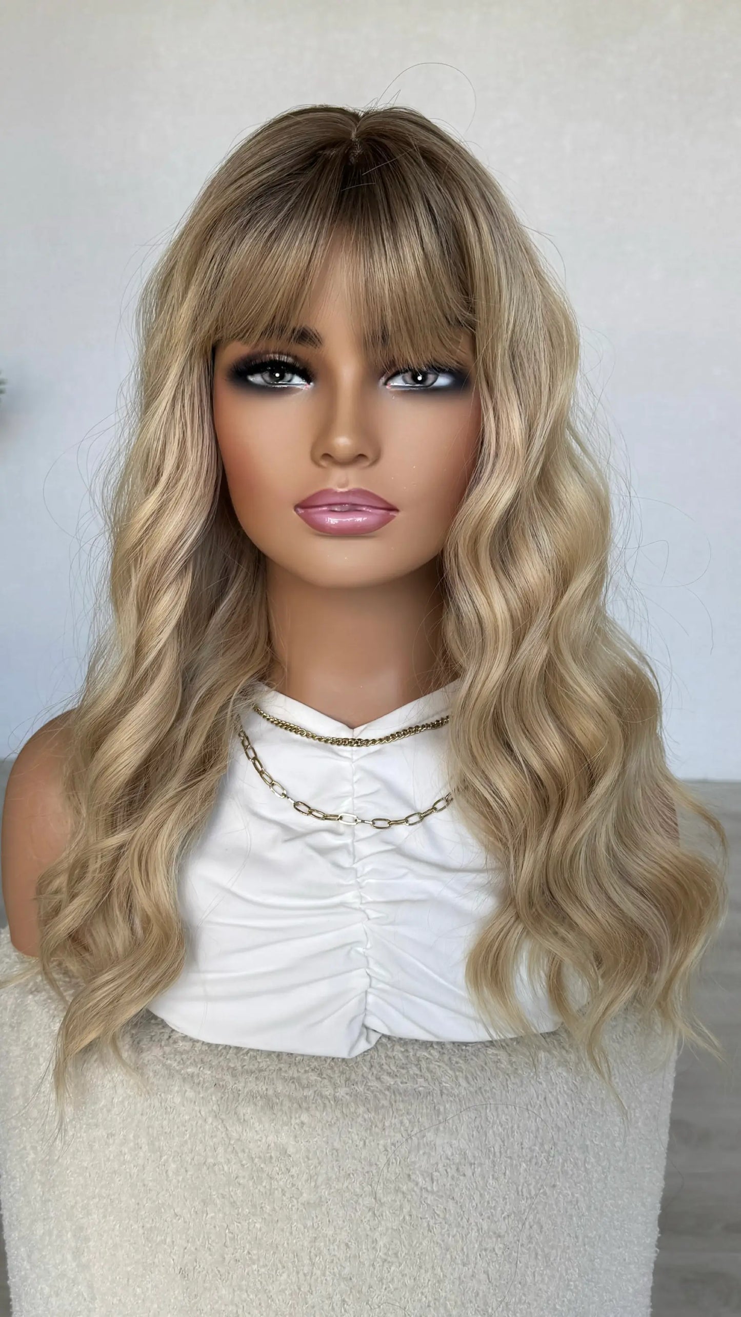 long blonde wavy wig, fringe wig australia, heat safe synthetic wig. wavy hair.