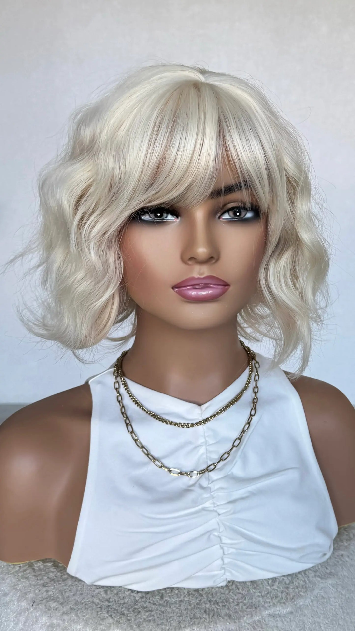 platinum blonde wavy fringe wig 10-12 inches. heat safe synthetic,