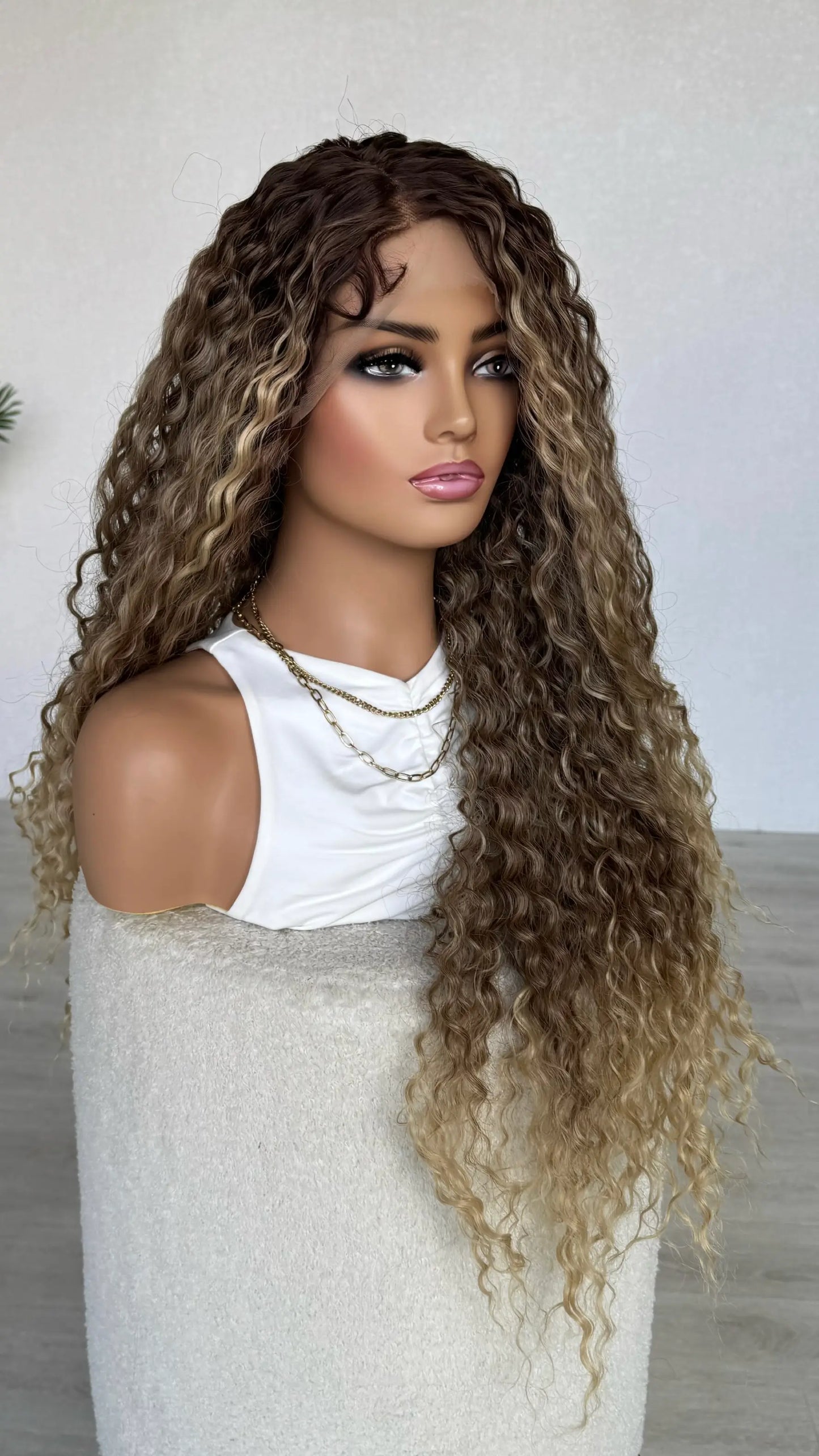 glueless synthetic lacefront curly wig australia. brown to blonde colour, 28 inches.
