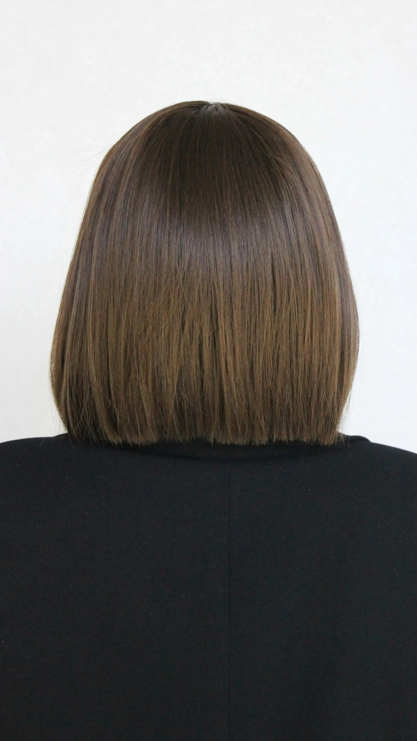 view from behind lacefront bob wig, baby hairs, straight cut.