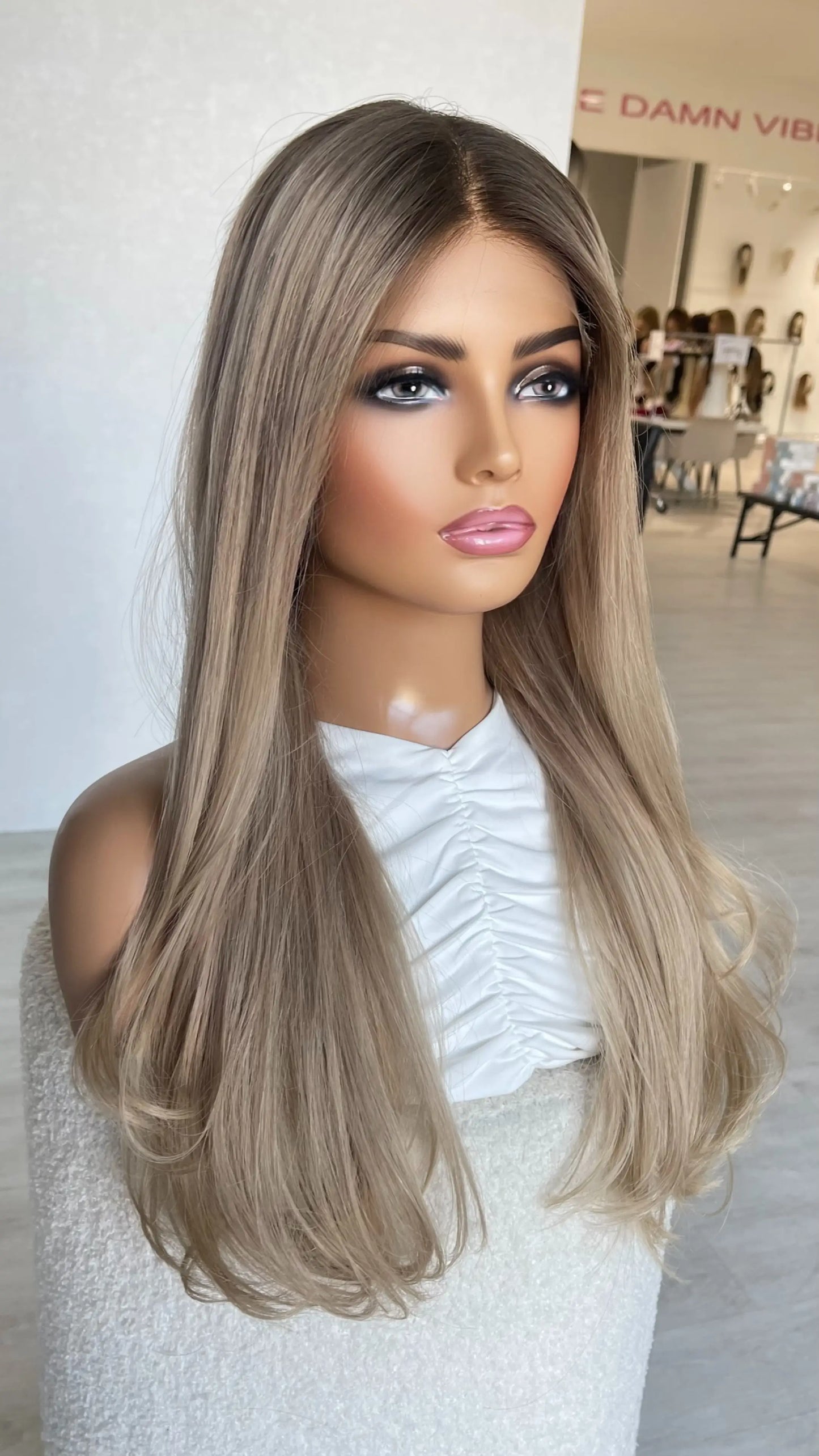 human hair wig, middle part with lacefront. long blonde hair with dark root. heat safe, stylable, medical wigs australia.