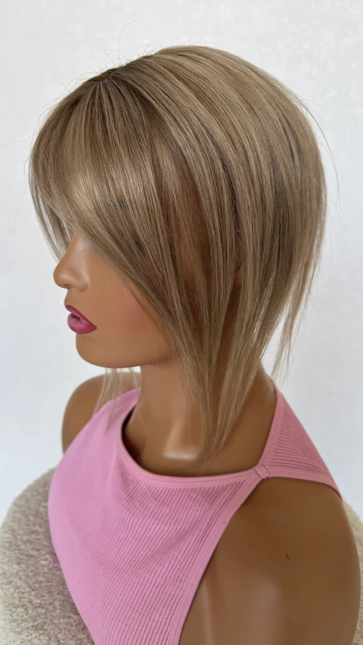 mixed ash blonde topper with ash tones, fine ends to blend with bio hair.