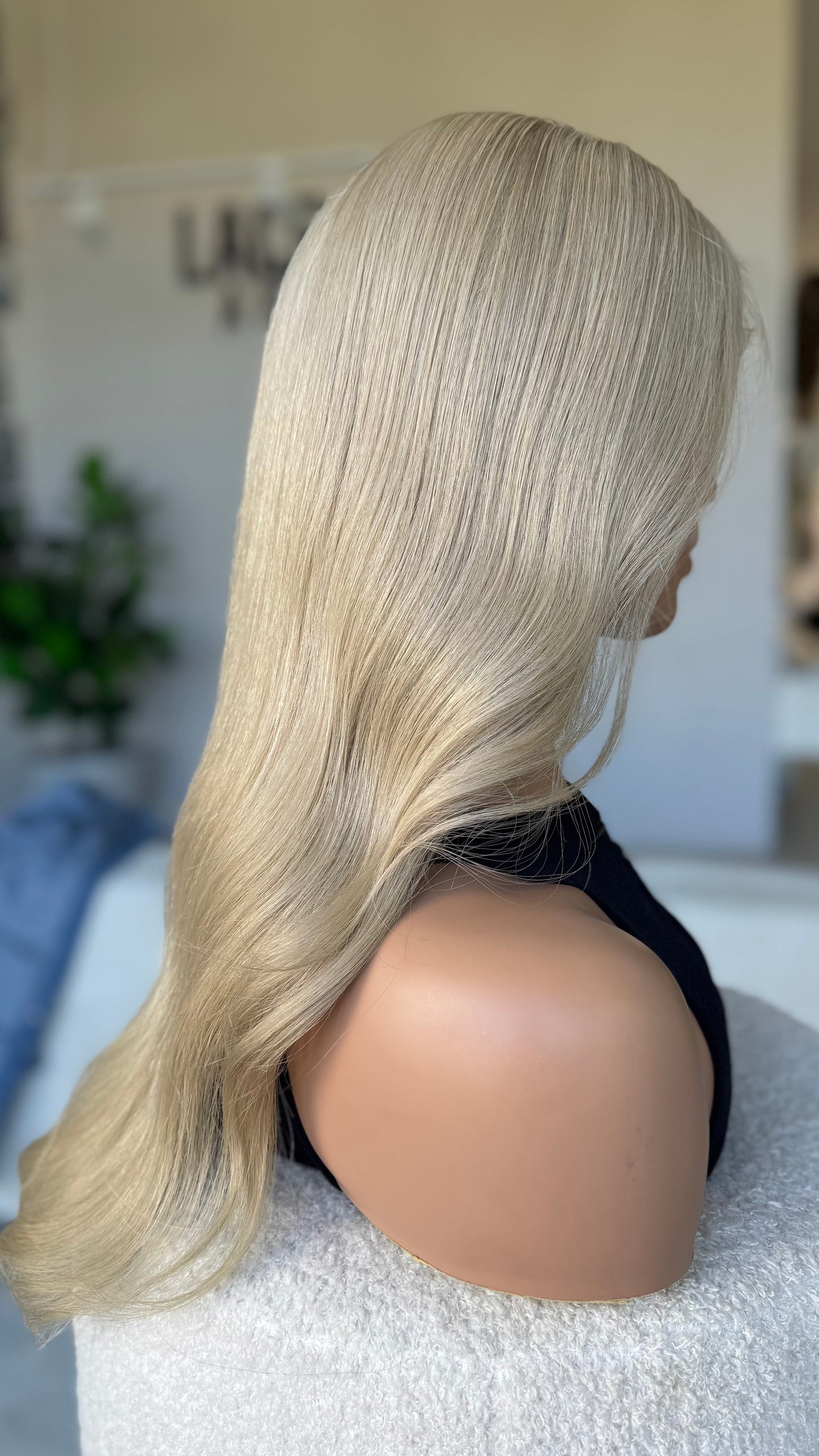 side on view, dior colour wig, bright blonde hair. human hair lacefront wig. australia.