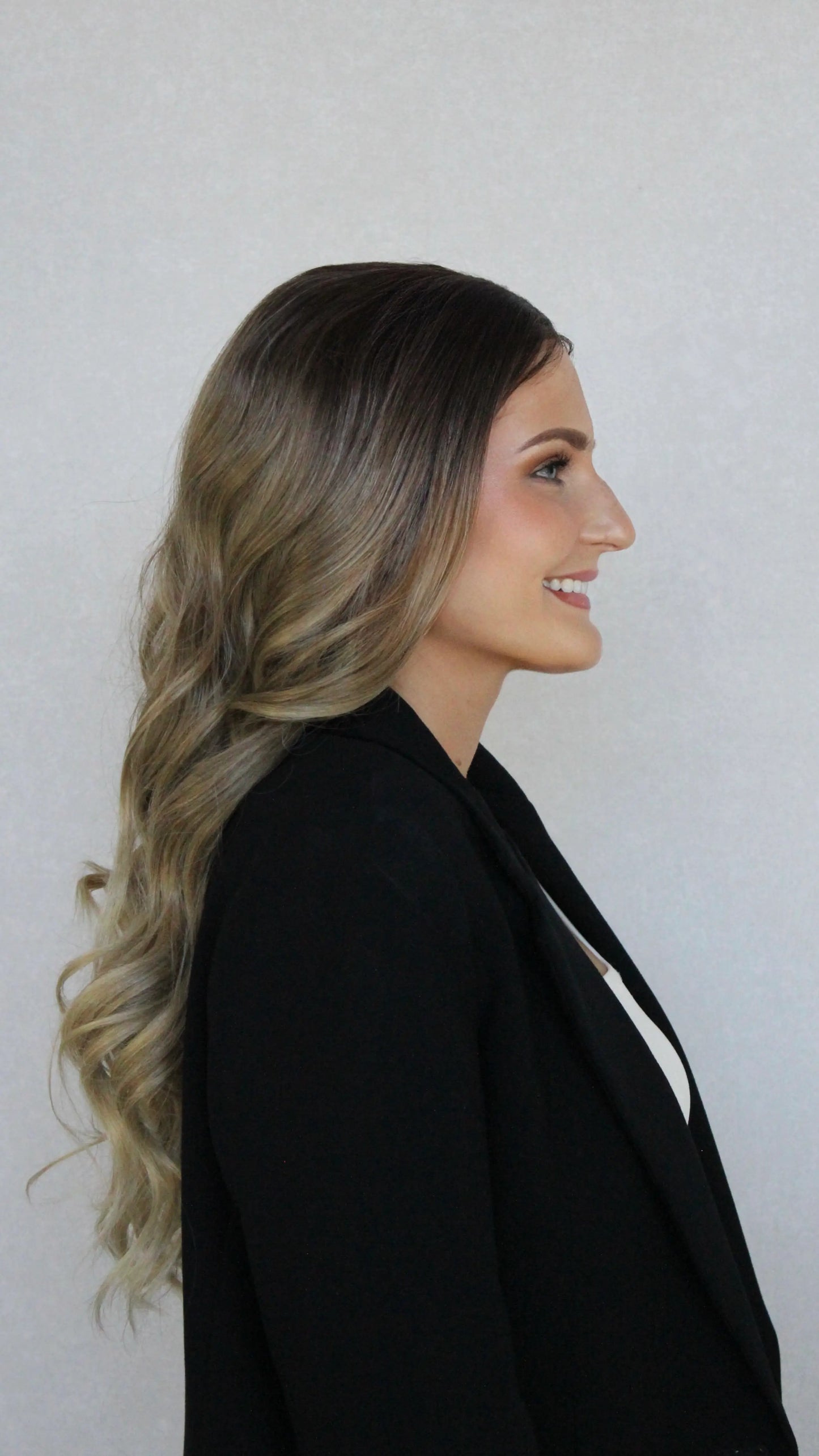 side view latte wig, dark brunette lacefront. blonde ends.