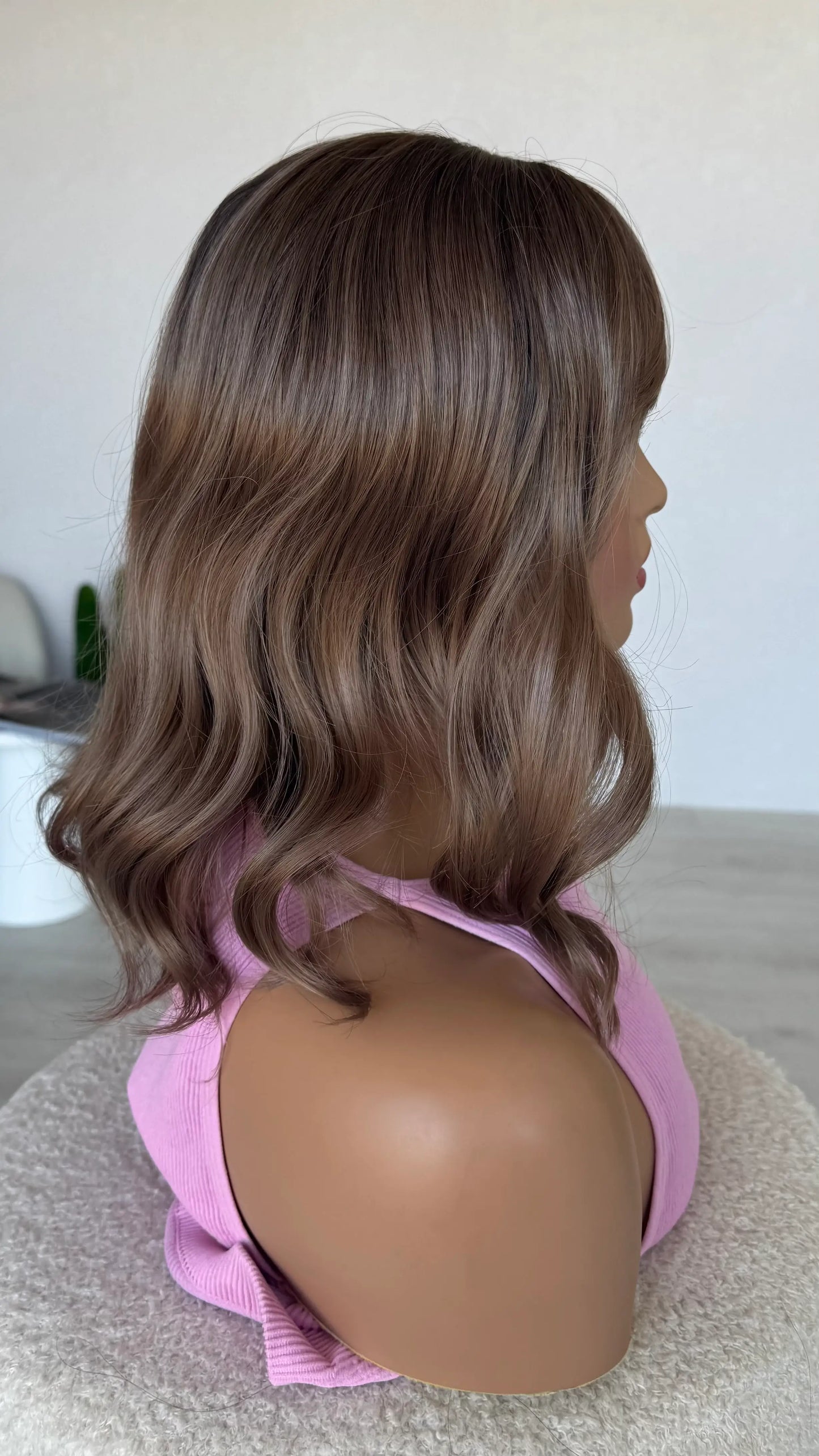 synthetic wig side view, curled end, heat safe hair.