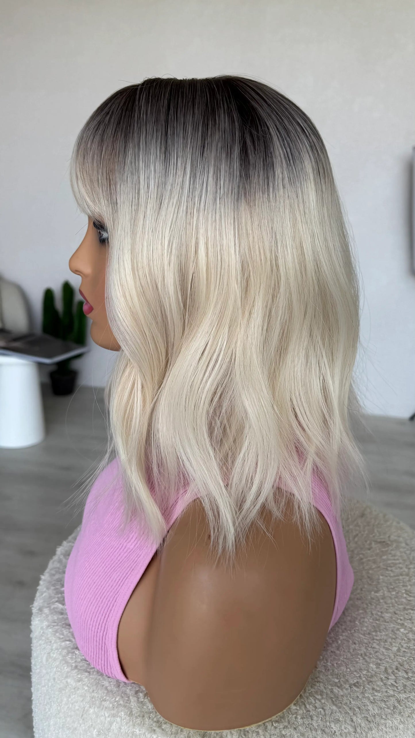 side view selena wig, platinum blonde hair.