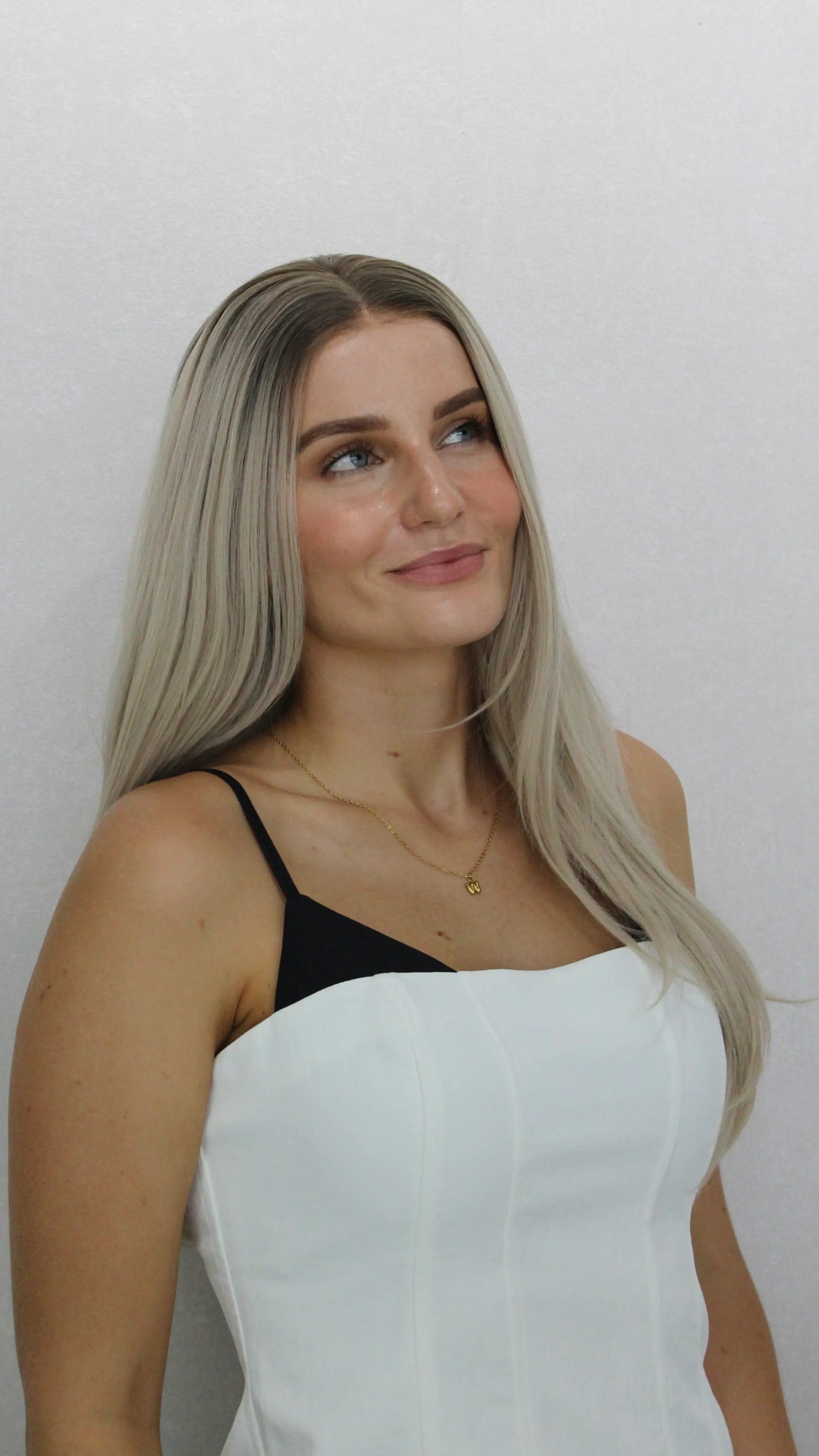 lacefront wig with middle part, darker root to pearl blonde hair, straight hair heat safe.