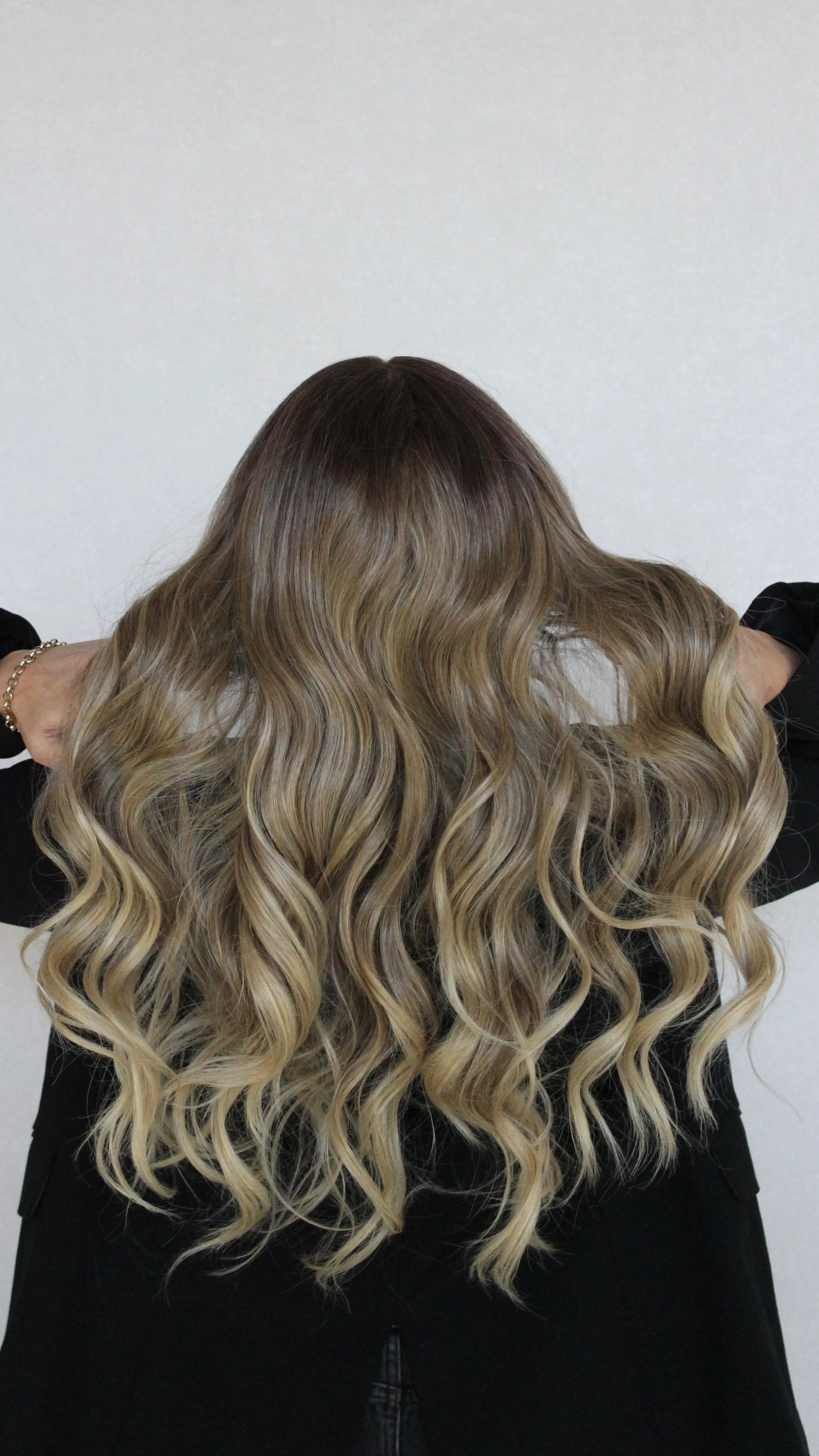 latte synthetic wig from behind.