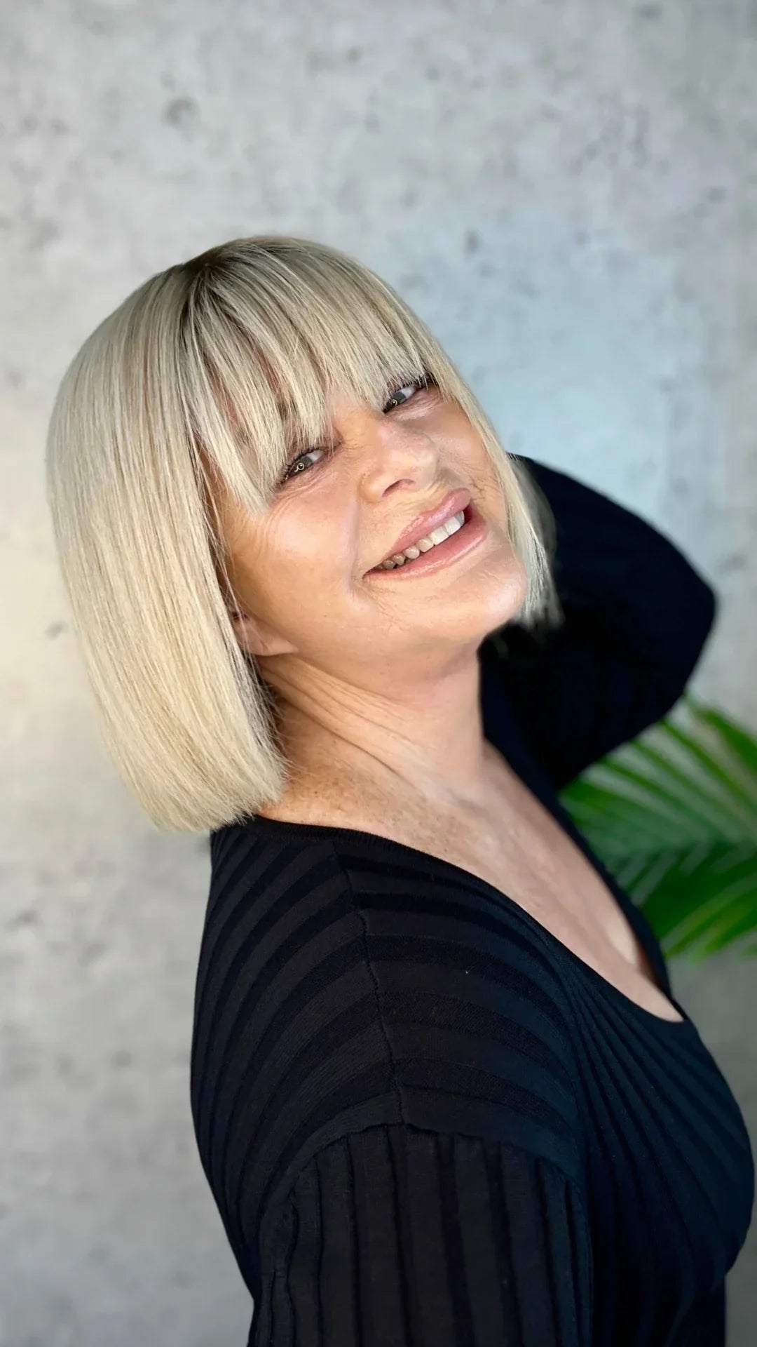 Elegant and effortless, a close-up of a luxury human hair wig styled for an ultra-natural finish