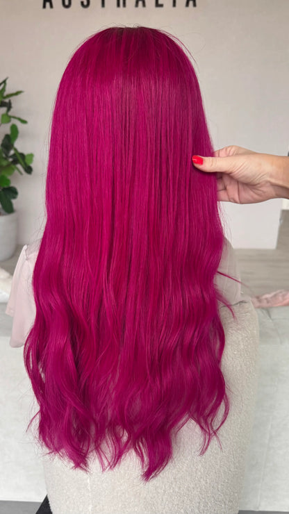 back view 24 inch pink hair, holding the long hair.