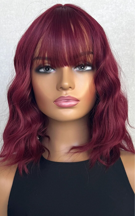 deep red wavy fringe wig side view, lob length. heat safe glueless synthetic wig australia.