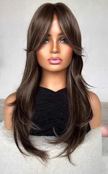 ash brunette hair, curtain bangs, front on, hair brushed more sleek.