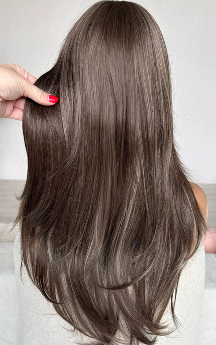 back view, showing ash brown hair colour with highlights.
