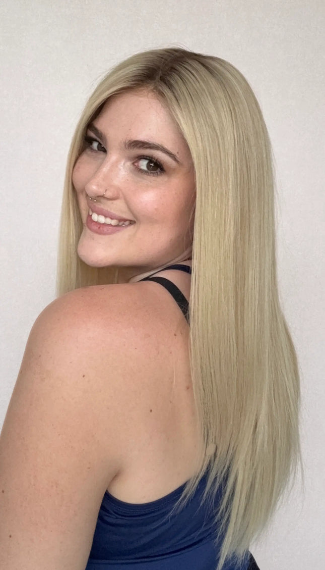 lace front wig, human hair, darker root to creamy blonde hair 22 inch length.