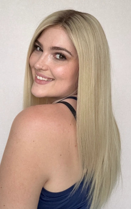 lace front wig, human hair, darker root to creamy blonde hair 22 inch length.