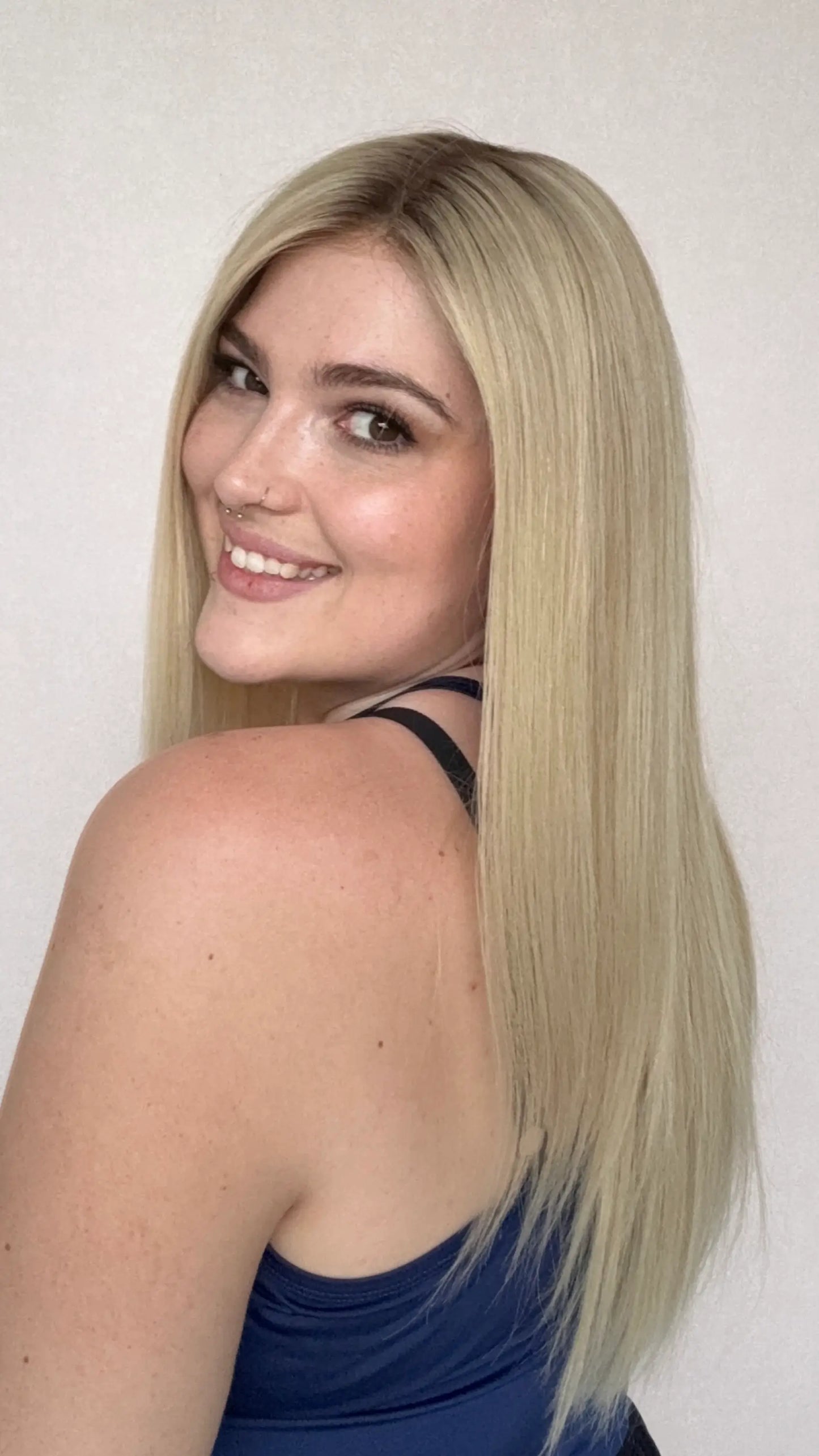 lace front wig, human hair, darker root to creamy blonde hair 22 inch length.