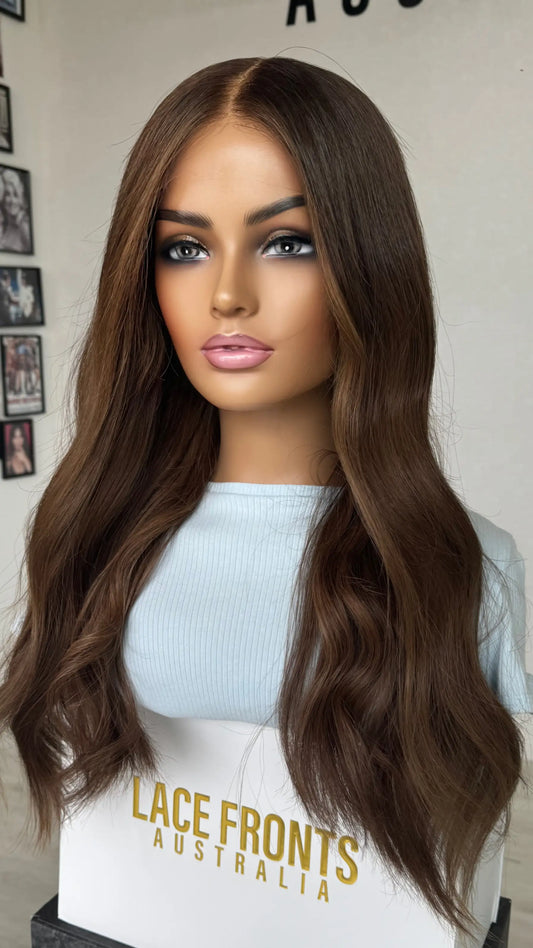 A 24-inch human hair lace front wig in rich chocolate brunette wavy hair lace front wig.