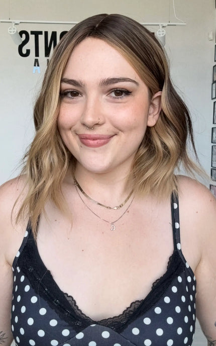 realistic looking wavy bob wig with middle part and heat safe hair.