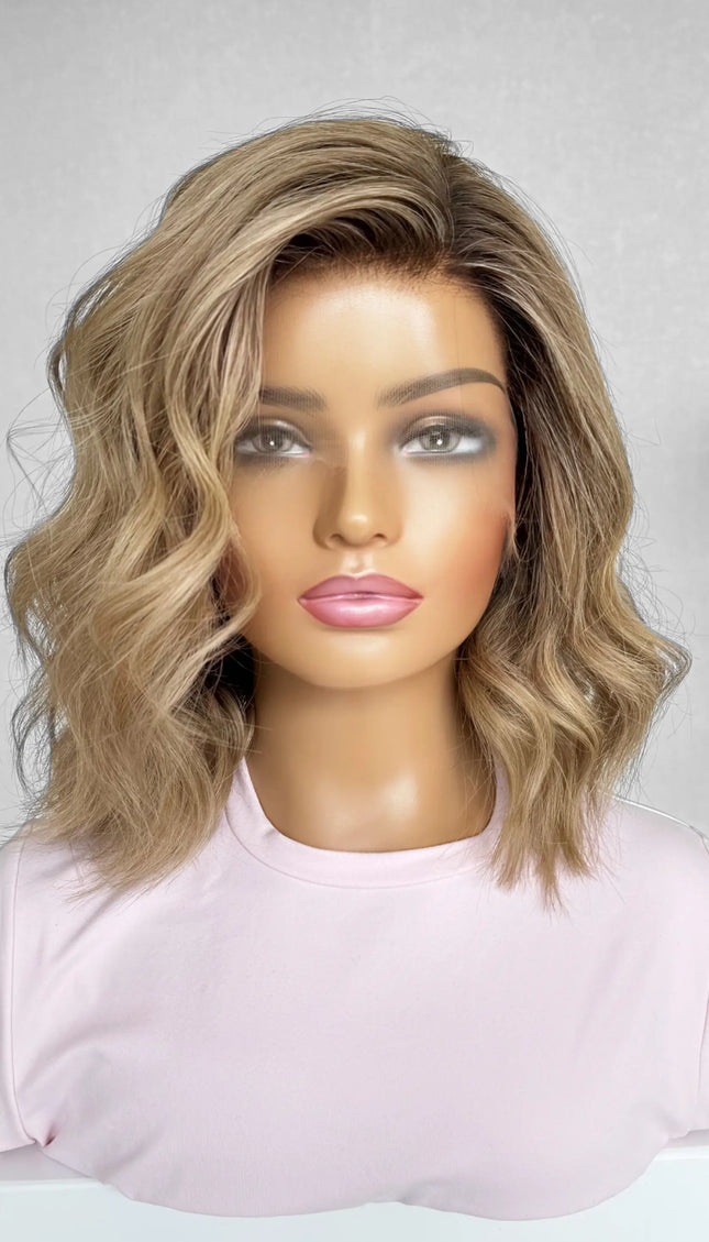A 14-inch human hair lace front wig in warm blonde with soft highlights, offering a sun-kissed glow and natural movement