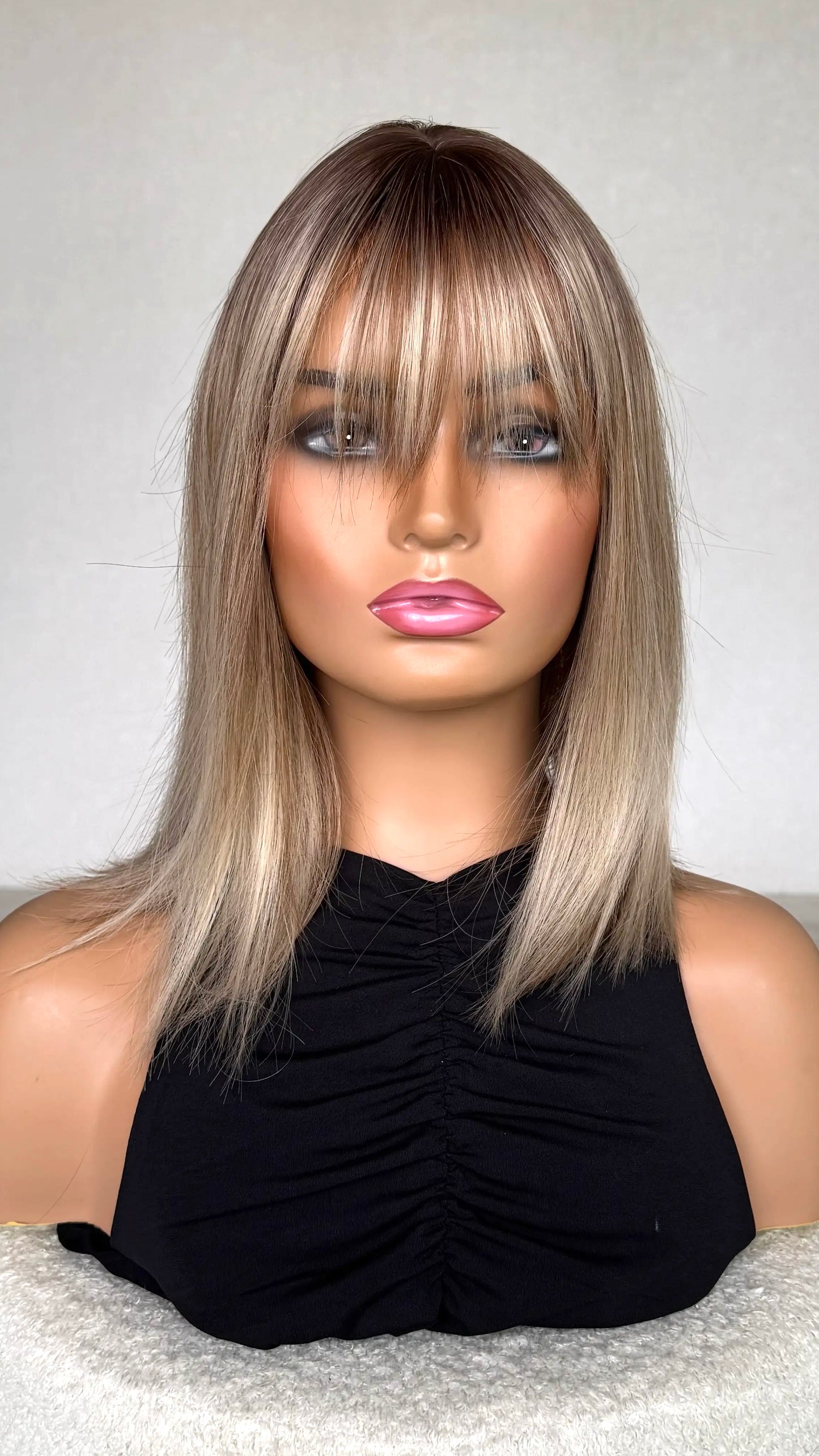 ash blonde fringe wig front on