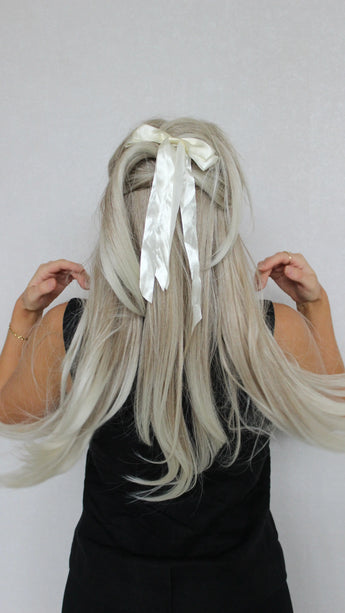 Layered Synthetic – Tinker from the back, hair tied up with bow clip. showing layered hair.