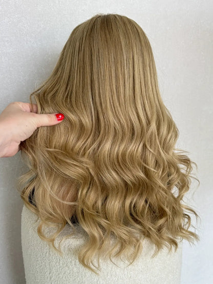 Back view of a 22-inch lace front wig in golden blonde