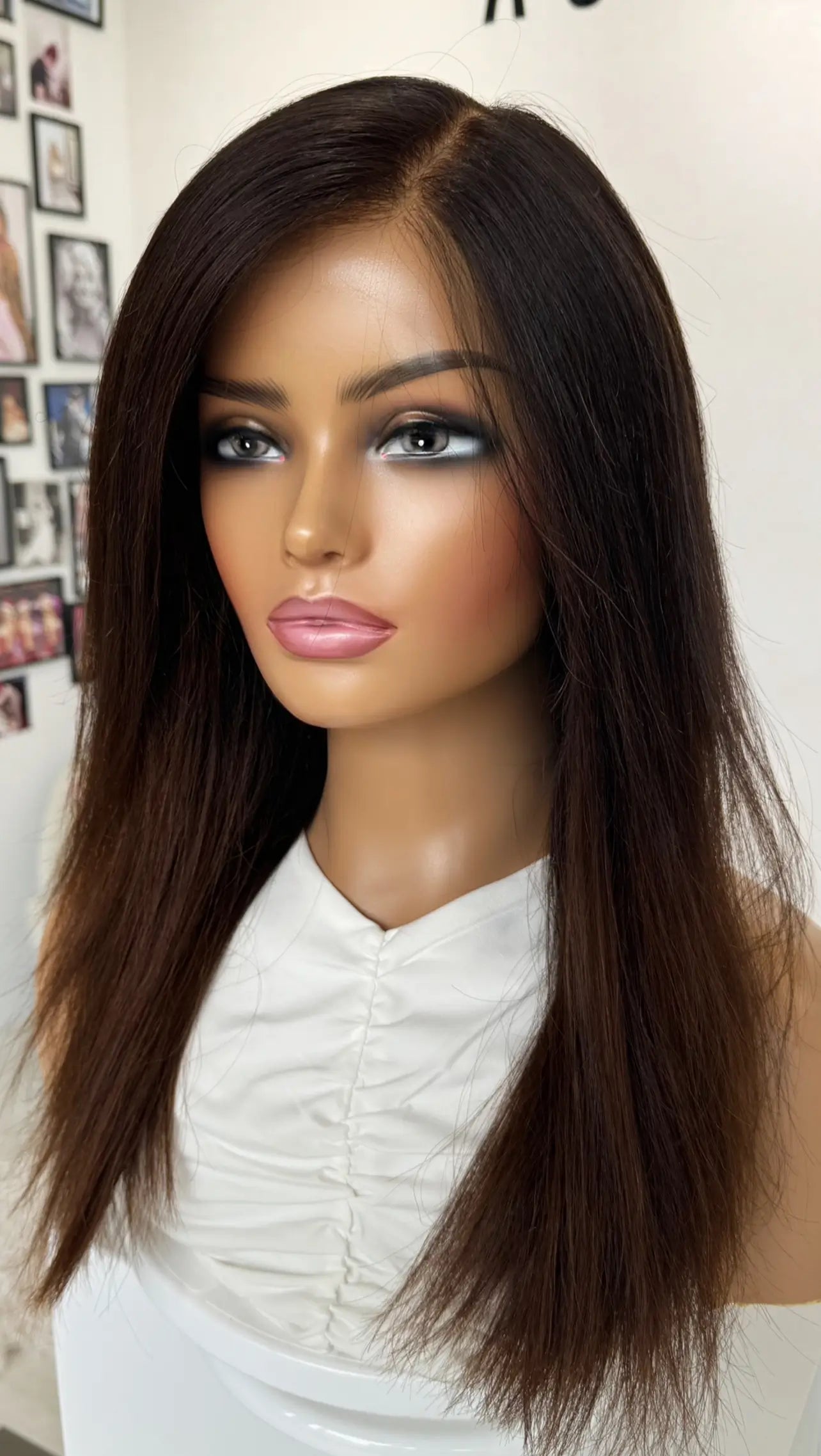 A 20-inch human hair lace front wig in black with warm highlights and a soft ombre effect, creating a natural, sun-kissed blend