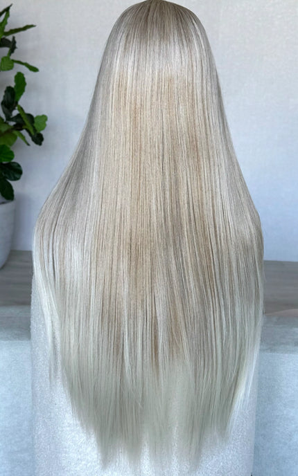 blonde lacefront wig from the back, long straight hair.