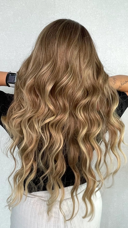 golden blonde ombre, synthetic wig from the back, heat safe hair.