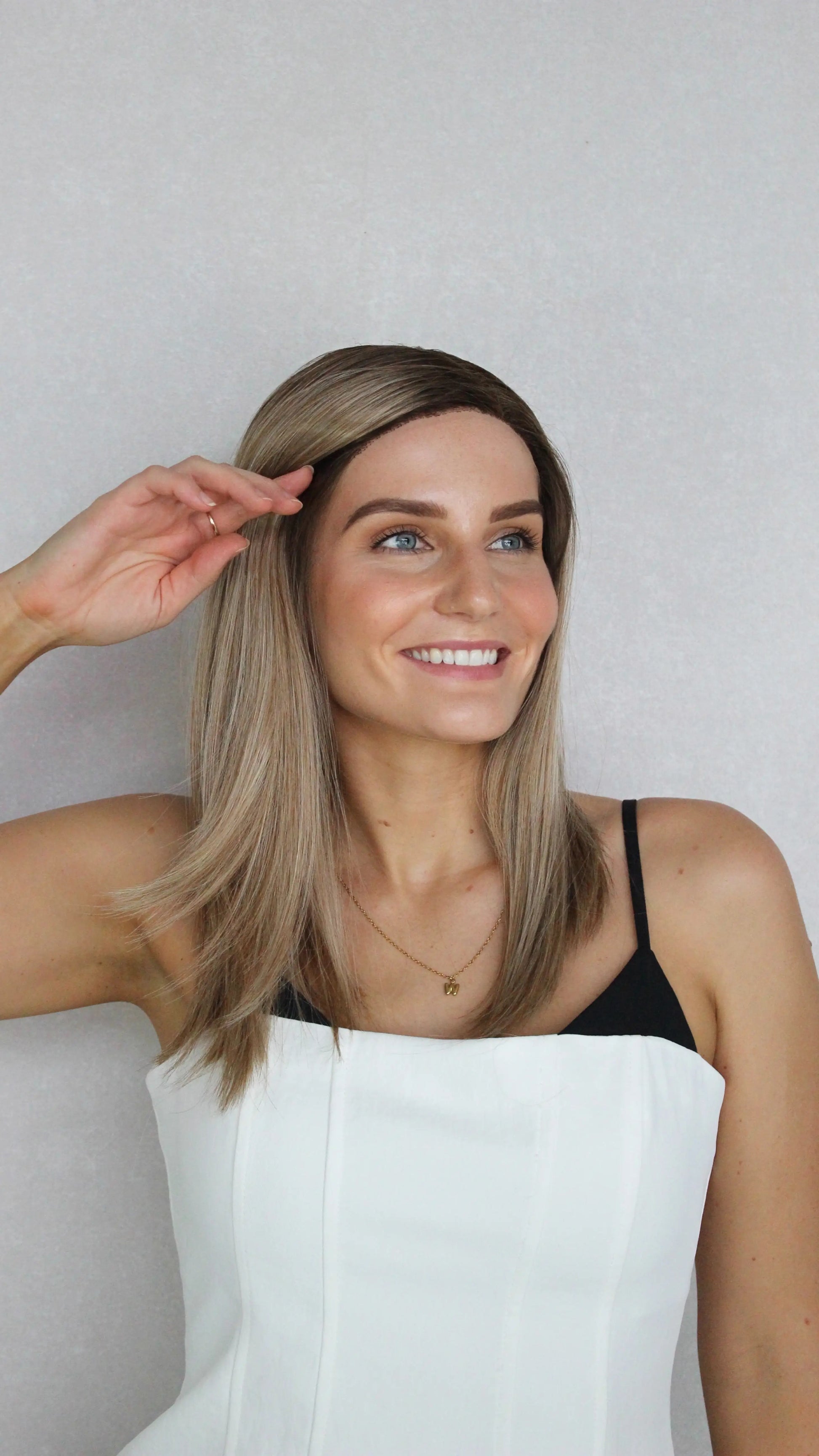 Multi-Toned Bronde with Root T-Part Synthetic Wig - Sarah 
pulled back showing natural hairline, heat safe hair.
