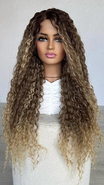 hair parted to the left side, long curly wig, heat safe synthetic hair.