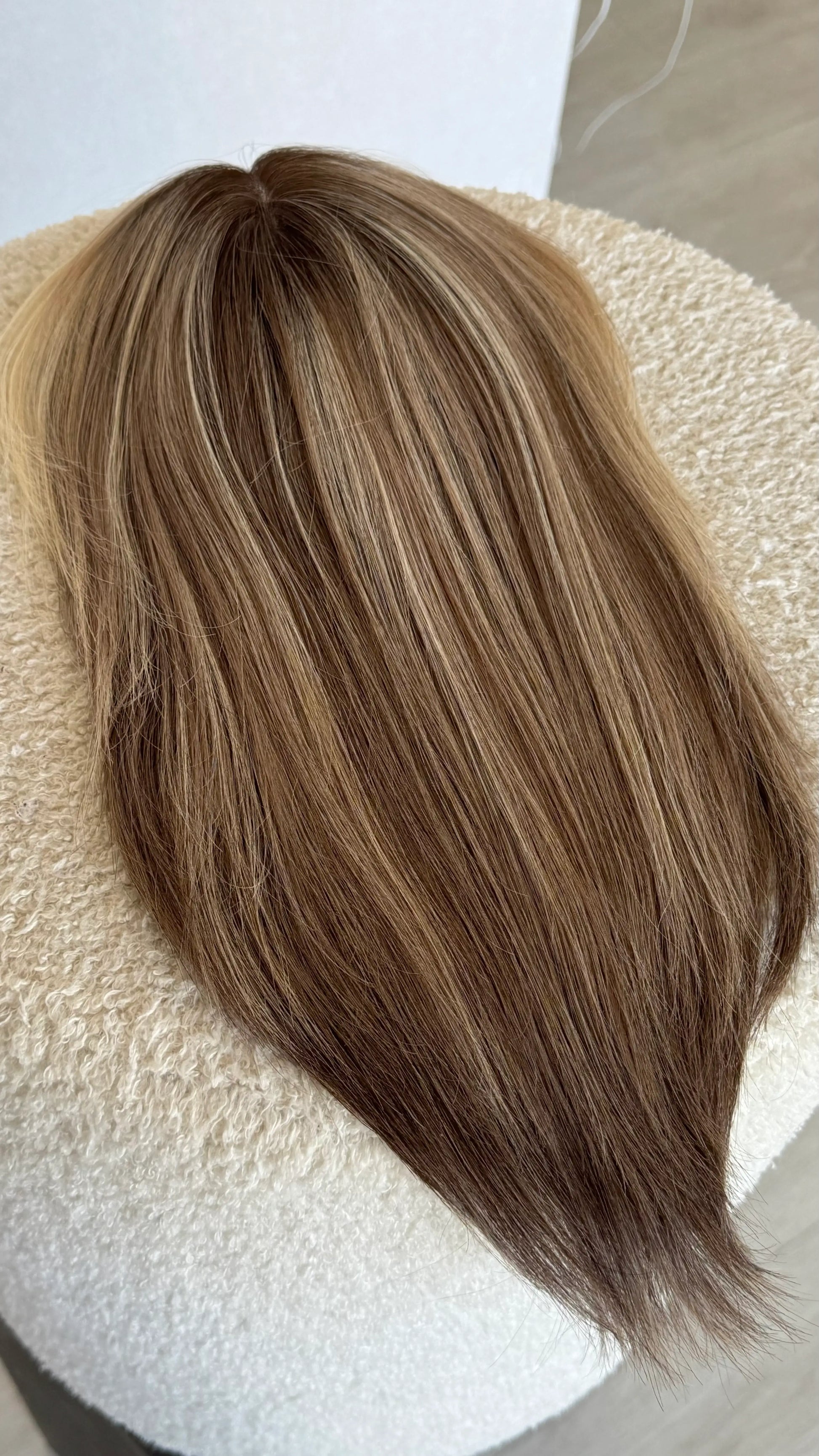 lacefront topper from top view, showing hair colours