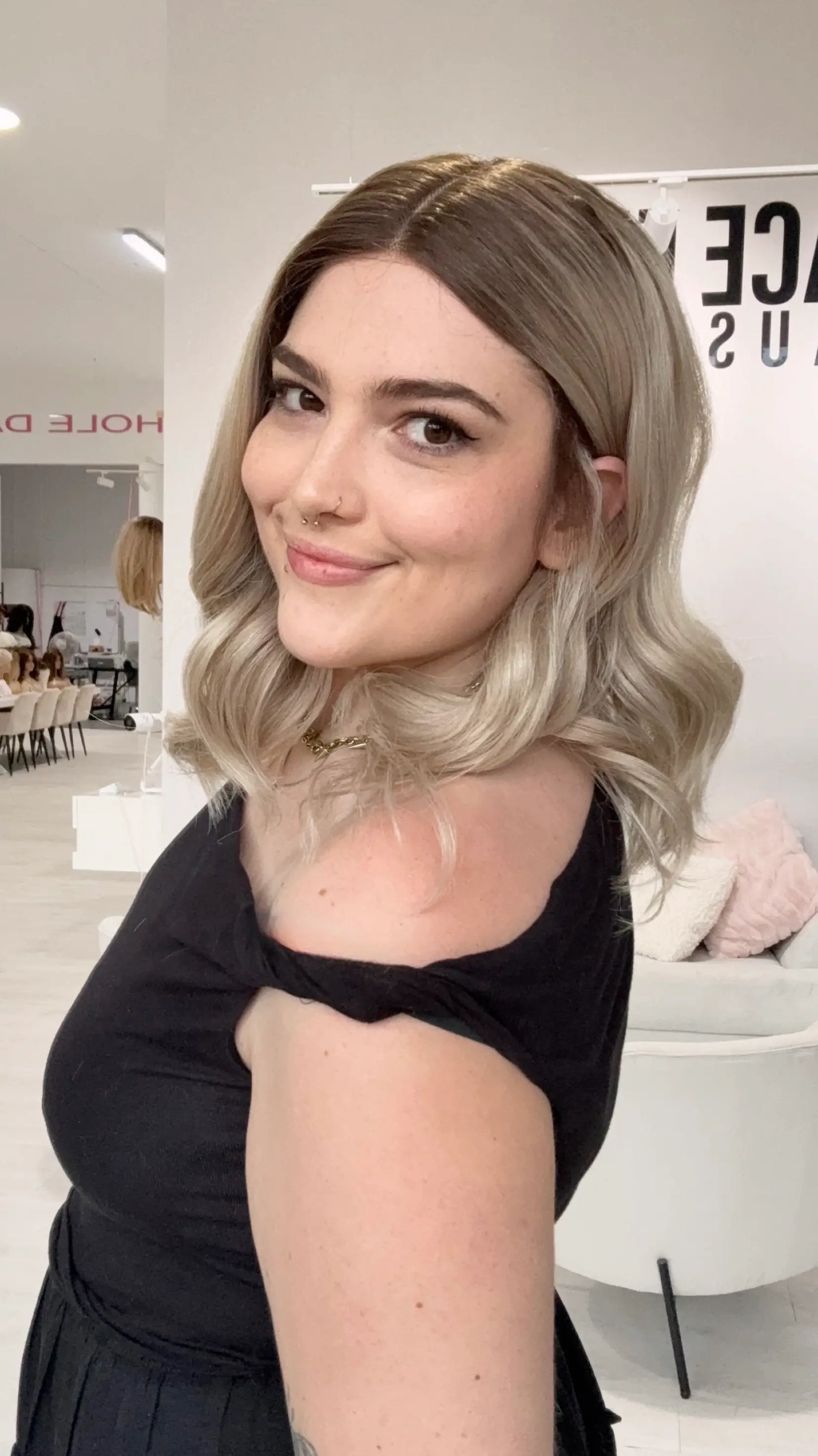 glueless synthetic wig with ash blonde hair. middle part, heat safe wig. gold coast australia.