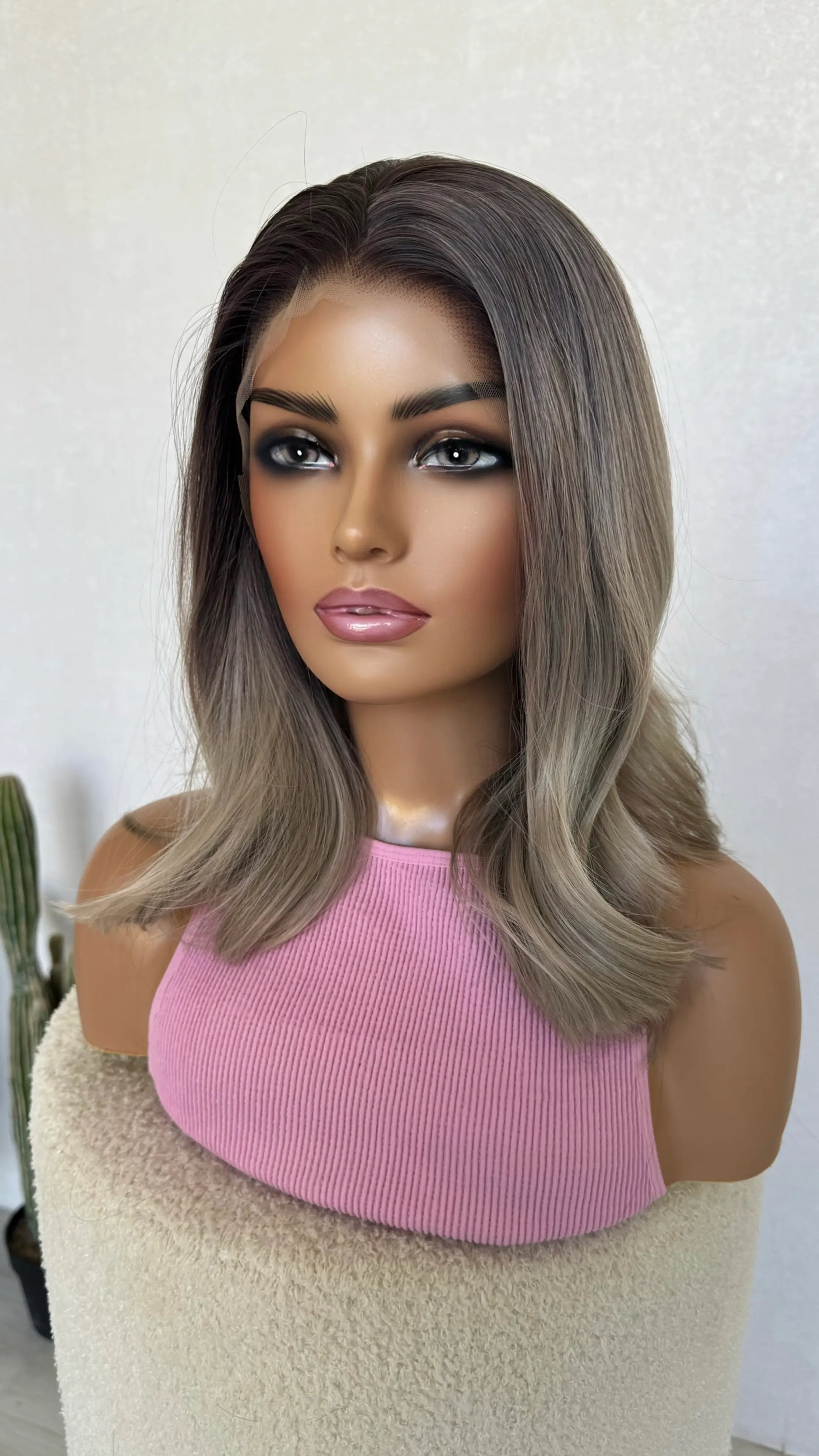 ash blonde lacefront with dark root, 14 inch length hair.