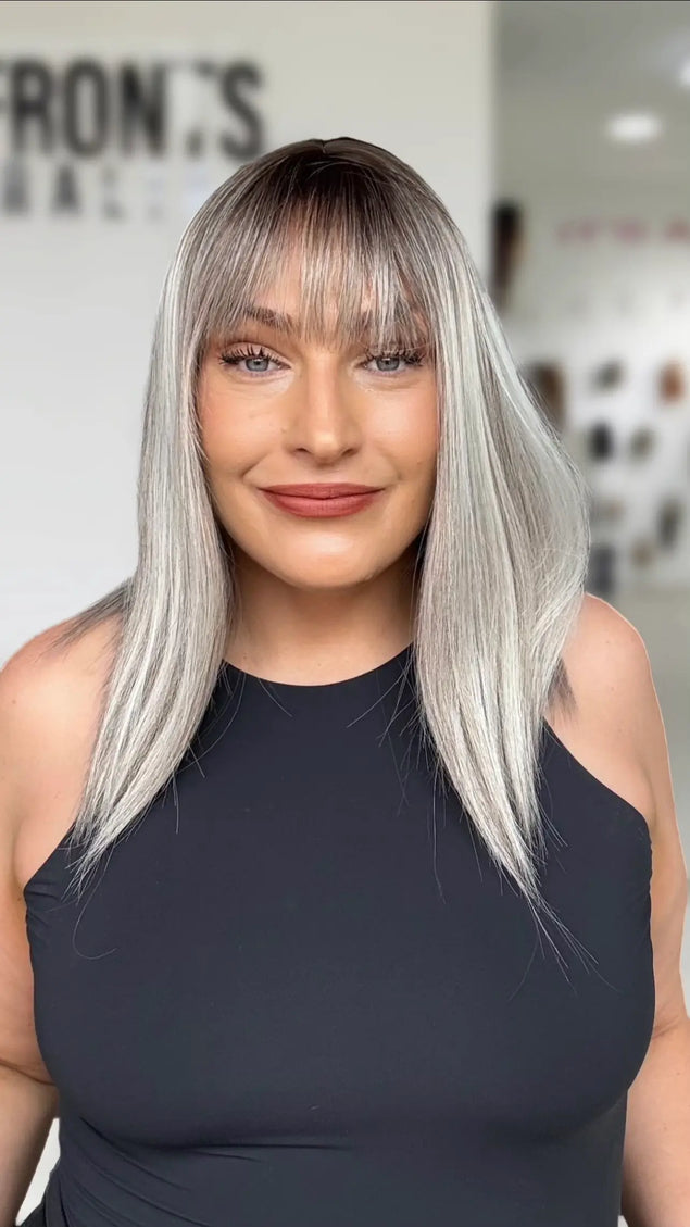 ash grey highlighted straight hair long bob with middle part and wispy soft fringe. 16 inch length.