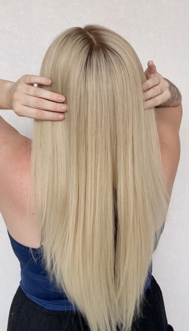 creamy blonde hair wig, lace wig, darker root, 22 inch hair, back view.