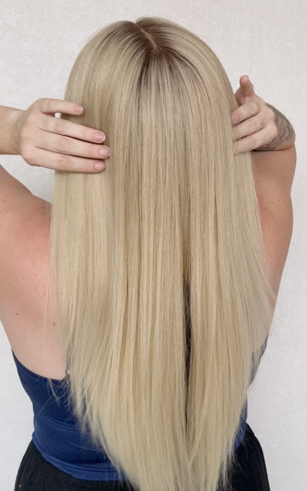 creamy blonde hair wig, lace wig, darker root, 22 inch hair, back view.