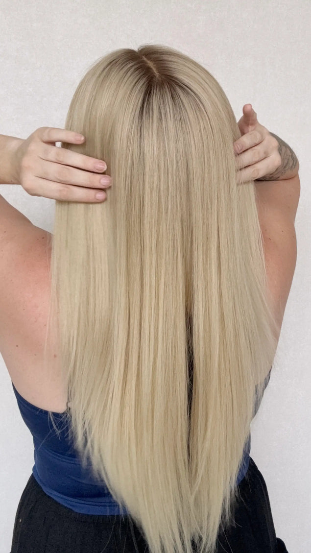 creamy blonde hair wig, lace wig, darker root, 22 inch hair, back view.